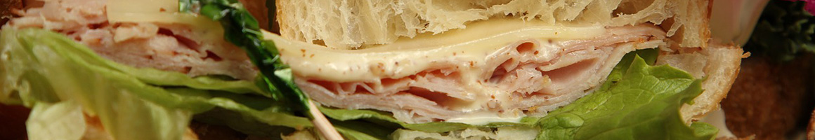 Eating Sandwich Cafe Bakery at Pitango Bakery + Cafe restaurant in Baltimore, MD.